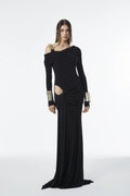 Asymmetric one-strap dress with gold detail, long sleeves, front draping, and side peekaboo cutout.