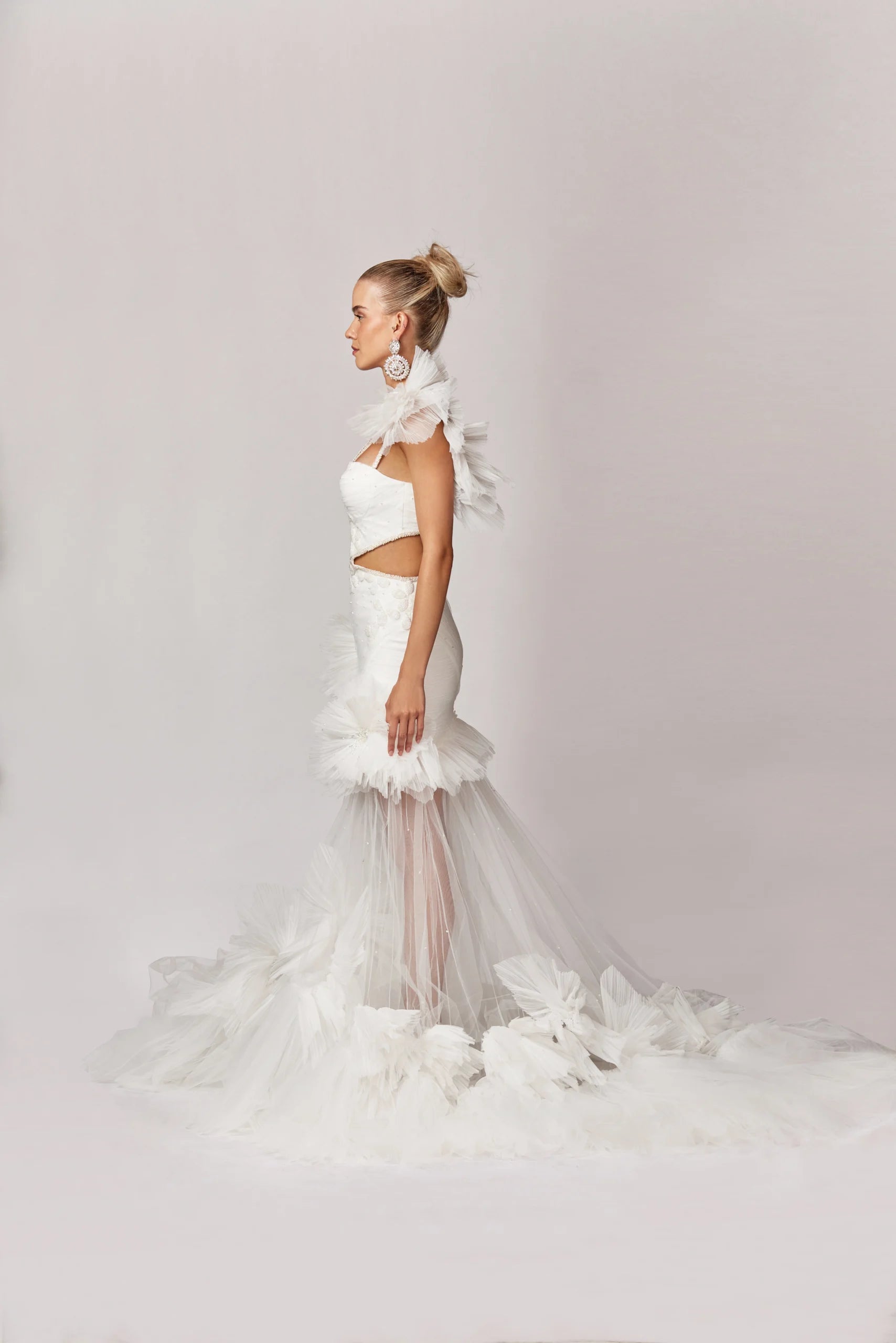 High-Low Tulle Mini Dress with Sides and Front Cut-outs.