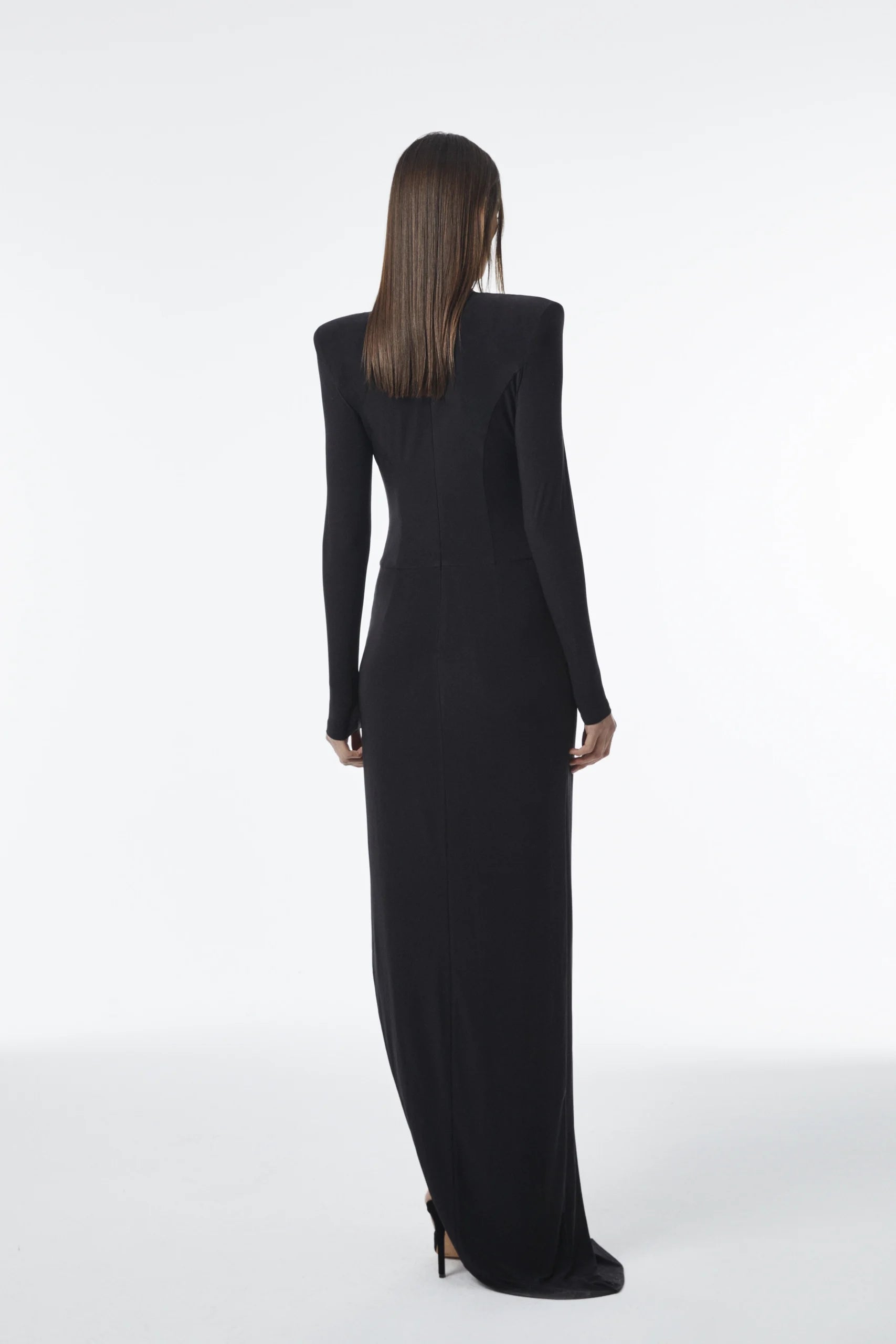 Long-sleeve draped maxi dress with elegant Side slit detail.