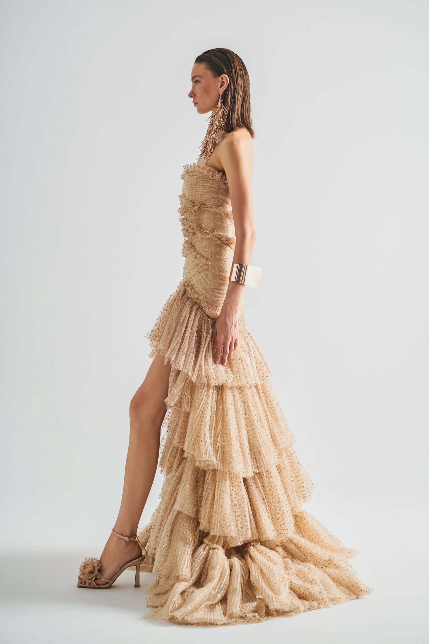Strapless High-Low Dress features sheer point d’esprit tulle